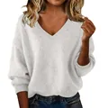 Detail showing soft texture of a loose white V-neck knitted sweater for women - S / Tops / White