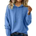 Close-up of a blue hooded sweater featuring drawstrings and a soft knit texture - S / Tops / Blue