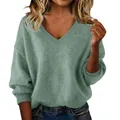 Detail view of a soft sage green V-neck knit sweater featuring a loose and comfortable fit. - S / Tops / Light Green