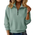 Detail eines salbeigrünen Strickpullovers mit Reißverschluss und Rippbündchen - S / Oberteile / Hellgrün