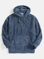 Close-up detail of men's blue corduroy long sleeve hoodie with pocket and drawstring - S / Tops / Denim Blue