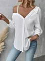 Detailed view of a white textured off-the-shoulder button-down shirt with a lapel collar - S / Tops / White