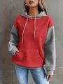 Detail view showing the textured fabric of a women's red and grey color-blocked hooded sweatshirt - S / Tops / Red & Grey