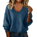 Detailed view of the soft knit texture and V-neck design on a loose blue women's sweater - S / Tops / Navy Blue