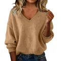 Close-up of women's camel V-neck knit sweater with soft fuzzy texture and loose fit - S / Tops / Khaki