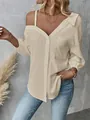Detail of beige off-shoulder textured shirt with front buttons and single pocket - S / Tops / Apricot