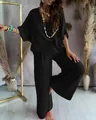 Elegante conjunto de dos piezas negro con top escote en V y pantalones anchos a juego - Negro