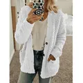 Detail view of cozy white teddy fleece cardigan jacket with large pockets for women - S / Tops / White