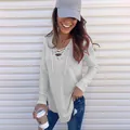 Close-up view of a woman wearing a stylish grey lace-up V-neck long-sleeve T-shirt top - S / Tops / Light Gray