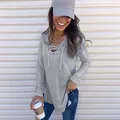 Detailed close-up of grey long sleeve V-neck lace-up loose fit casual top for women - S / Tops / Gray