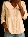Detailed view of women's cotton linen blouse with ruffled doll collar and buttons. - S / Tops / Khaki