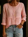 Vue détaillée d'une blouse à manches longues rose pâle en mélange de coton texturé - Rose