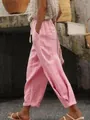 Side detail of pink cotton linen casual pants featuring a drawstring waist and side pockets. - S / Bottoms / Pink