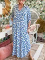 Vue complète de la robe chemise à fleurs bleues dans un intérieur bohème - S / Hauts / Bleu Marine Imprimé Pâquerettes