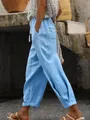 Detailed side view of women's light blue cotton linen pants with pockets. - S / Bottoms / Sky Blue