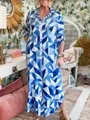 Gros plan sur la robe chemise maxi à imprimé géométrique bleu avec col et manches - S / Hauts / Bleu Patchwork Géométrique