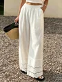 Pantalon large en coton et lin blanc pour femme avec broderie en dentelle sur le bas - S / Bas / Blanc