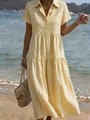 Detailed look at tiered light yellow short sleeve shirt dress with textured pleats - S / Yellow