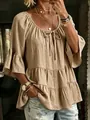 Bohemian beige tiered blouse with bell sleeves and tie-neck detail in macro view - S / Tops / Khaki