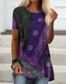Detail of women's short sleeve tunic with purple digital polka dot and floral print. - S / Tops / Purple