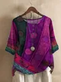 Close-up detail of the vibrant bohemian digital print texture on this loose tunic top - S / Tops / Purple