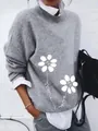 Detailed view of white floral prints on a grey brushed loose long-sleeved sweater - Medium Gray White Floral Print