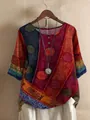 Detail of women's loose bohemian tunic with colorful digital print and button neck. - S / Tops / Red