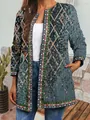 Detailed view of vintage ethnic print and geometric trim on long-sleeved cardigan - M / Tops / Blue