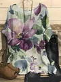 Close-up view of casual loose short sleeve top featuring artistic watercolor floral print - S / Tops / Purple Watercolor Floral (Image 40)