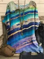 Close-up showing the vibrant blue and green marbled print on casual round neck top - S / Tops / Marble Pattern Abstract Print (Image 9)