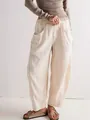 Minimalist casual loose cotton linen carrot pants in beige with elastic waist and pockets - S / Bottoms / Ivory