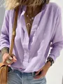 Close-up of a lavender loose-fitting long-sleeve linen shirt with elegant vintage buttons - Light Purple