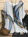 Detailed view of women's loose round neck top with abstract blue and gold print - S / Tops / Gray Blue Abstract Spiral Print (图21)