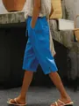 Detailweergave van blauwe katoenen linnen korte broek met trekkoord en een zijzak - S / Bottoms / Blauw