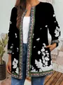 Close-up view of a stylish vintage ethnic floral print cardigan for women in black finish - M / Tops / Black With White Flowers