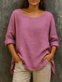 Detalle de una camiseta de lino oversize malva con cuello redondo y mangas remangadas. - S / Tops / Rosa rojo