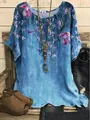 Casual blue short-sleeved summer top featuring an artistic floral and hummingbird print design - S / Tops / Light Blue Floral (Image 11)