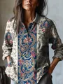 Close-up of vintage floral print on casual long-sleeved shirt with side pockets - S / Tops / Red and Blue Vintage Floral