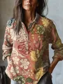 Close-up detail of vintage floral print long-sleeve shirt with button neck and pocket - S / Tops / Brick Red and Olive Floral