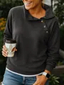 Close-up of casual dark grey sweatshirt featuring unique diagonal button-down collar - Black