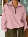 Vista dettagliata di una felpa rosa da donna con mezza zip e colletto a revers alla moda. - Taglia S / Top / Rosa