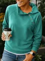 Detail view of a women's teal sweatshirt featuring a stylish buttoned side collar. - S / Tops / Verdant