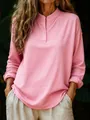 Detail view of pink long-sleeve blouse with a soft texture and stand collar design - S / Tops / Pink