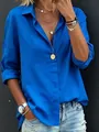 Close-up of royal blue long sleeve button-down shirt with elegant jewelry accessories - S / Tops / Blue
