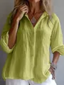 Detailweergave van de limoengroene linnen textuur op een ruimvallend shirt met knopen - S / Tops / Geel