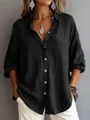 Casual women's loose black long sleeve button down shirt with textured linen look. - Black