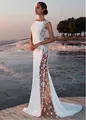 Robe de soirée élégante en dentelle blanche avec découpes latérales transparentes - S / Bas / Blanc