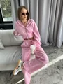 Professional detail view of a stylish women's pink two-piece tracksuit with zip-up hoodie. - S / Top And Bottom / Pink