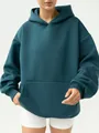 Casual tealgroene oversized dameshoodie met kangoeroezak en geribbelde manchetten - Marineblauw