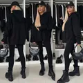 Set felpa con cappuccio e leggings neri oversize in tre diverse angolazioni - Taglia S / Top E Pantaloni / Nero